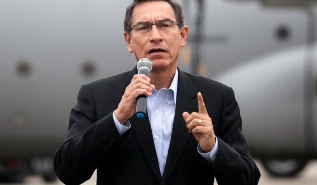 Peru's President Martin Vizcarra speaks to the media prior a deportation of Venezuelan migrants, after they were accused of concealing that they had criminal records, according to Peru's Interior Ministry, in Lima, Peru June 6, 2019. REUTERS/Guadalupe Pardo
