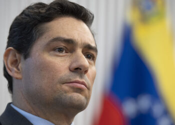 Venezuela's new charge d'affaires to the United States Carlos Vecchio looks on during a press conference in Washington, DC, on January 30, 2019. (Photo by Jim WATSON / AFP) / “The erroneous mention[s] appearing in the metadata of this photo by Jim WATSON has been modified in AFP systems in the following manner: [Venezuela's new charge d'affaires to the United States] instead of [Venezuelan Ambassador]. Please immediately remove the erroneous mention[s] from all your online services and delete it (them) from your servers. If you have been authorized by AFP to distribute it (them) to third parties, please ensure that the same actions are carried out by them. Failure to promptly comply with these instructions will entail liability on your part for any continued or post notification usage. Therefore we thank you very much for all your attention and prompt action. We are sorry for the inconvenience this notification may cause and remain at your disposal for any further information you may require.”