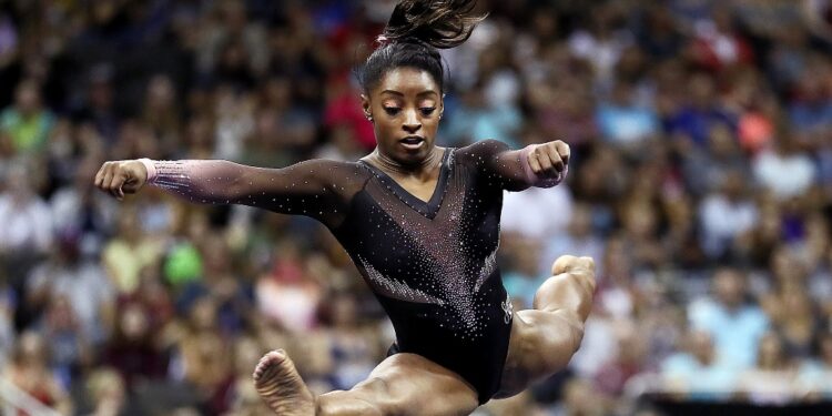 KANSAS CITY, MISSOURI - AUGUST 11:  Simone Biles competes on floor exercise during Women's Senior competition of the 2019 U.S. Gymnastics Championships at the Sprint Center on August 11, 2019 in Kansas City, Missouri. (Photo by Jamie Squire/Getty Images)