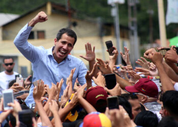 Venezuelan opposition leader Juan Guaido, who many nations have recognised as the country's rightful interim ruler, greets supporters after delivering a speech in Tovar, Venezuela June 14, 2019. REUTERS/Carlos Eduardo Ramirez