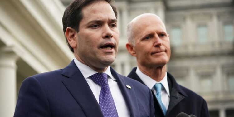 US senators Marco Rubio (L) and Rick Scott speak to reporters after a meeting with US President Donald Trump on Venezuela, outside of the West Wing of the White House in Washington, DC on January 22, 2019. (Photo by MANDEL NGAN / AFP)