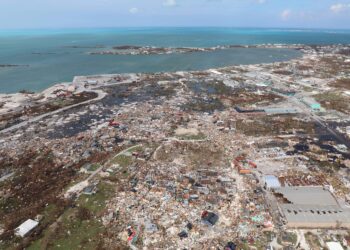 The destruction caused by Hurricane Dorian is seen from the air, in Marsh Harbor, Abaco Island, Bahamas, Wednesday, Sept. 4, 2019. The death toll from Hurricane Dorian has climbed to 20. Bahamian Health Minister Duane Sands released the figure Wednesday evening and warned that more fatalities were likely. (AP Photo/Gonzalo Gaudenzi)