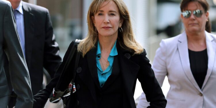 Mandatory Credit: Photo by Charles Krupa/AP/Shutterstock (10185765e)
Actress Felicity Huffman arrives at federal court in Boston, to face charges in a nationwide college admissions bribery scandal
College Admissions-Bribery, Boston, USA - 03 Apr 2019