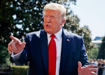 Mandatory Credit: Photo by Evan Vucci/AP/Shutterstock (10358411u)
President Donald Trump talks to reporters on the South Lawn of the White House, in Washington, as he prepares to leave Washington for his annual August holiday at his New Jersey golf club
Trump, Washington, USA - 09 Aug 2019