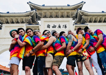 Participants from Thailand pose in front of the Chiang Kai-shek Memorial Hall as they take part in the annual gay pride parade in Taipei on October 26, 2019. - Some two hundred thousand revellers marched through Taipei in a riot of rainbow colours and celebration on October 26 as Taiwan held its first pride parade since making history in Asia by legalising gay marriage. (Photo by Sam YEH / AFP)