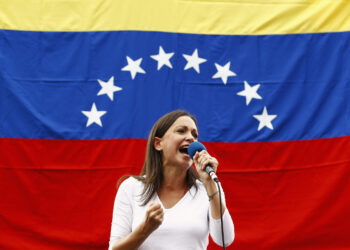 Opposition deputy Maria Corina Machado speaks during a rally against Nicolas Maduro's government in Caracas March 3, 2014. Jailed Venezuelan opposition leader Leopoldo Lopez urged sympathizers on Monday to maintain street protests against President Nicolas Maduro as the country's foreign minister prepared to meet the United Nations Secretary General. REUTERS/Carlos Garcia Rawlins (VENEZUELA - Tags: POLITICS CIVIL UNREST) - RTR3FZXR