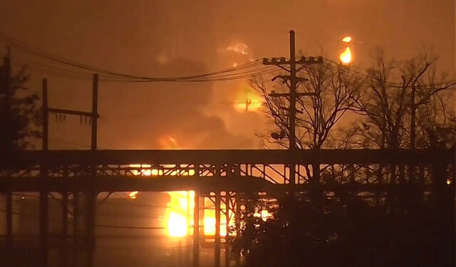 Flames rise over a petrochemical plant after an explosion in a still image from video in Port Neches, Texas, U.S. November 27, 2019.  12NewsNow.com via REUTERS. NO ARCHIVES. NO SALES. THIS IMAGE HAS BEEN SUPPLIED BY A THIRD PARTY. MANDATORY CREDIT.