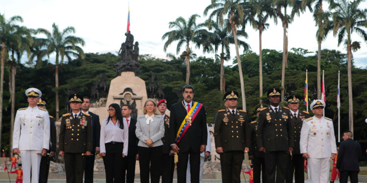 Venezuela's President Nicolas Maduro stands next to his wife Cilia Flores, Venezuela's Vice President Delcy Rodriguez and military commanders during a ceremony to celebrate the 198th anniversary of the Battle of Carabobo, near Valencia, Venezuela June 24, 2019. Miraflores Palace/Handout via REUTERS ATTENTION EDITORS - THIS PICTURE WAS PROVIDED BY A THIRD PARTY.