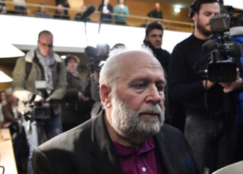Bernard Preynat, a former priest accused on sexual assaults, waits the beginning of his trial, on January 13, 2020, in the courthouse of Lyon, southeastern France. - The trial of Bernard Preynat , whose alleged sexual assaults on young scouts in the Lyon region triggered the Barbarin case, was postponed on January 14, 2020 due the lawyers strike. (Photo by PHILIPPE DESMAZES / AFP)