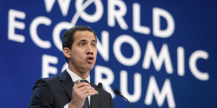 Venezuelan opposition leader Juan Guaido addresses the World Economic Forum (WEF) annual meeting in Davos, on January 23, 2020. (Photo by FABRICE COFFRINI / AFP)