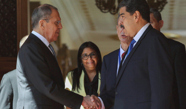 Venezuela's President Nicolas Maduro shakes hands with Russia's Foreign Minister Sergey Lavrov at the Miraflores Palace in Caracas, Venezuela February 7, 2020. REUTERS/Manaure Quintero