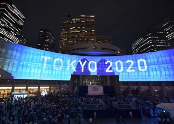 A projection that reads "Tokyo 2020" is seen during a ceremony marking three years to go before the start of the Tokyo 2020 Olympic games at the Tokyo Metropolitan Assembly Building on July 24, 2017.
Japan marked three years before the 2020 Tokyo Olympics on July 24 with celebration and fanfare -- even as organisers struggle to contain soaring costs and restore credibility. / AFP PHOTO / Kazuhiro NOGI        (Photo credit should read KAZUHIRO NOGI/AFP via Getty Images)