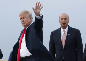 FILE - In this July 10, 2018, file photo, President Donald Trump is joined by Gordon Sondland, the U.S. ambassador to the European Union, second from right, as he arrives at Melsbroek Air Base, in Brussels, Belgium. Sondland, wrapped up in a congressional impeachment inquiry, was a late convert to Trump, initially supporting another candidate in the Republican primary and once refusing to participate in a fundraiser on his behalf.   (AP Photo/Pablo Martinez Monsivais, File)