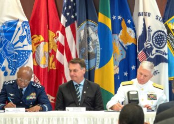 The President of Brazil Jair Bolsonaro (C) attends to a welcoming ceremony to the US Southern Command headquarters , in Miami, Florida, USA on 08 March 2020. Next to Bolsonaro is the Admiral Craig Faller, commander of the SOUTHCOM. The governments of Brazil and the United States of America signed the Research, Development, Test and Evaluation Agreement (RDT & E). The objective of RDT & E is to pave the way for the two governments to develop future joint projects aligned with the mutual interest of the parties, covering the possibility of improving or providing new military capabilities. (Brasil, Estados Unidos) EFE/EPA/CRISTOBAL HERRERA