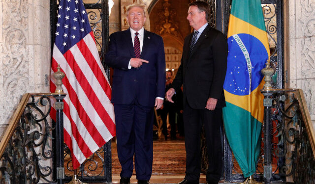 U.S. President Donald Trump hosts a photo-op with Brazilian President Jair Bolsonaro before attending a working dinner at the Mar-a-Lago resort in Palm Beach, Florida, U.S., March 7, 2020. REUTERS/Tom Brenner