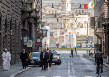 Pope Francis walks in a deserted Rome to pray at two shrines for the end of the coronavirus pandemic, in Rome, Italy March 15, 2020. Vatican Media/?Handout via REUTERS ATTENTION EDITORS - THIS IMAGE WAS PROVIDED BY A THIRD PARTY.