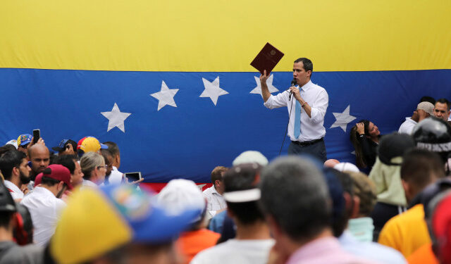 Venezuela's National Assembly President and opposition leader Juan Guaido, who many nations have recognised as the country's rightful interim ruler, gestures as he speaks during a demonstration in Caracas, Venezuela March 10, 2020. REUTERS/Manaure Quintero