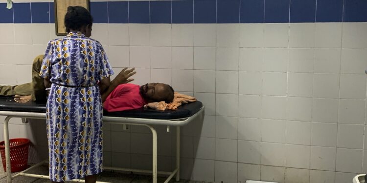 A patient waits in the emergency room at the Guiria hospital, in Guiria, Venezuela, on March 14, 2020. - Human rights organizations recently warned Venezuela faced catastrophic consequences from the COVID-19 coronavirus pandemic which threatens to overwhelm its crumbling health system. (Photo by Federico PARRA / AFP)