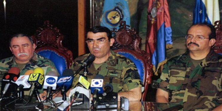 Lucas Rincón Romero, acompañado de Jorge Sierralta y Régulo Anselmi el día 12 de Abril de 2002, momentos antes de anunciar que Hugo Chávez Frías abandonaba el cargo de Presidente de la República de Venezuela.