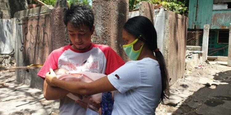 Young couple John Tupas and Colline Tabesa named their first born Covid Marie, after the coronavirus disease 2019 pandemic. Photo courtesy of Adrian Prietos