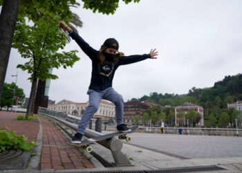 Egoitz Bijueska, 9, grinds a rail on a skateboard at the Guggenheim Museum, on his first day out in six weeks after restrictions were partially lifted for children, during the coronavirus disease (COVID-19) outbreak in Bilbao, Spain, April 26, 2020. REUTERS/Vincent West