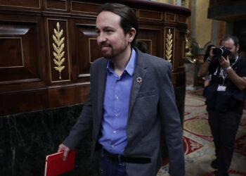 Podemos party leader Pablo Iglesias arrives at the Spanish Parliament in Madrid, Spain, Tuesday, Jan. 7, 2020. Spanish lawmakers are due to vote Tuesday on whether to endorse the formation of a Socialist-led coalition government, ending almost a year of political limbo for the eurozone's fourth-largest economy. (AP Photo/Manu Fernandez)