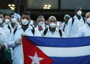 More than 50 doctors and paramedics arrived in Milan from Cuba on March 22 to help with coronavirus treatment.
