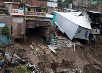 View of houses devastated by the overflowing of a creek due to the torrential rains caused by the passage of tropical storm Amanda in San Salvador on May 31, 2020. - Tropical storm Amanda, the first named storm of the season in the Pacific, lashed El Salvador and Guatemala on Sunday, leaving nine people dead amid flooding and power outages. (Photo by Yuri CORTEZ / AFP)
