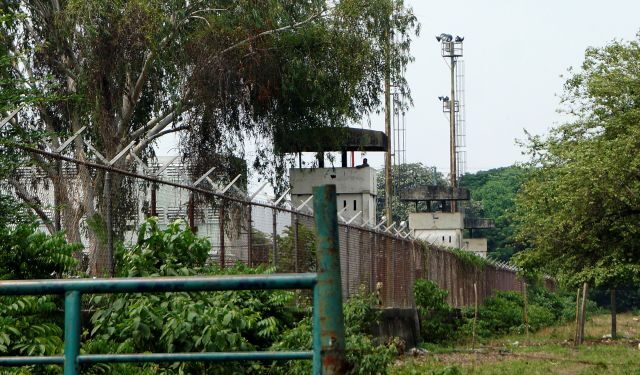 Security towers are seen at Los Llanos penitentiary after a riot erupted inside the prison leaving dozens of dead as the coronavirus disease (COVID-19) continues in Guanare, Venezuela May 2, 2020. REUTERS/Freddy Rodriguez NO RESALES. NO ARCHIVE.