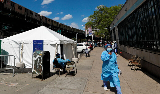 People wait to be tested at the walk-up coronavirus Covid-19 testing site at the Dyckman Clinica De Las Americas in Inwood, New York, USA. EFE/EPA/Peter Foley