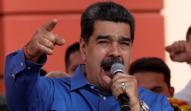 Venezuela's President Nicolas Maduro gestures as he speaks during a rally commemorating the Youth Day, in Caracas, Venezuela February 12, 2020. REUTERS/Fausto Torrealba NO RESALES, NO ARCHIVES