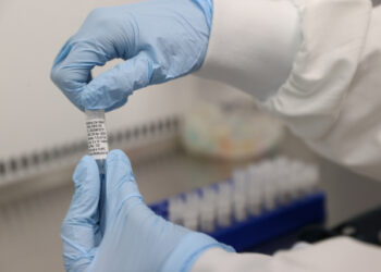 Scientists are seen working at Cobra Biologics, they are working on a potential vaccine for COVID-19, following the outbreak of the coronavirus disease (COVID-19), in Keele, Britain, April 30, 2020.  REUTERS/Carl Recine
