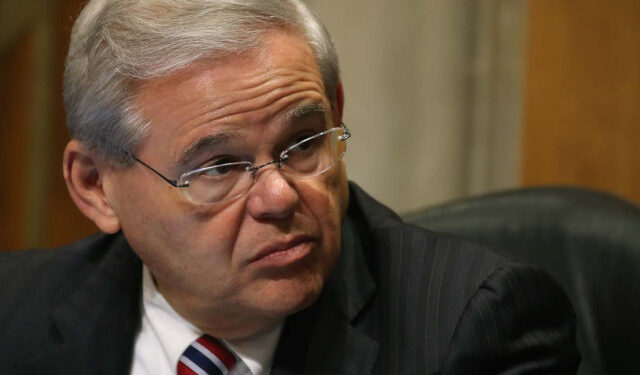 WASHINGTON, DC - MARCH 10: Sen. Bob Menendez (D-NJ) (R) participates in a Senate Foreign relations Committee hearing on Capitol Hill, March 10, 2015 in Washington, DC. The committee was hearing from us government officials on the situation in Ukraine.   Mark Wilson/Getty Images/AFP