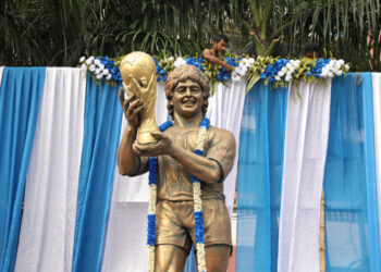 A garlanded statue of Argentine soccer great Diego Maradona is seen before a prayer meeting, in Kolkata, India, November 26, 2020. REUTERS/Rupak De Chowdhuri