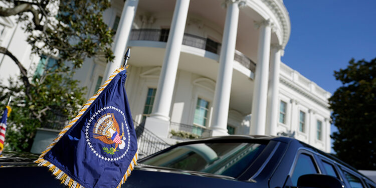 A vehicle sits outside the White House as President Donald Trump prepares to visit the Republican National Committee annex office, on Election Day, Tuesday, Nov. 3, 2020, in Washington. (AP Photo/Alex Brandon)