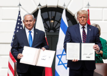 Israel's Prime Minister Benjamin Netanyahu stands with U.S. President Donald Trump after signing the Abraham Accords, normalizing relations between Israel and some of its Middle East neighbors,  in a strategic realignment of Middle Eastern countries against Iran, on the South Lawn of the White House in Washington, U.S., September 15, 2020. REUTERS/Tom Brenner