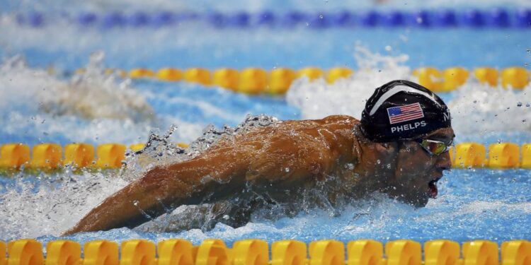 2016 Rio Olympics - Swimming - Final - Men's 4 x 100m Medley Relay Final - Olympic Aquatics Stadium - Rio de Janeiro, Brazil - 13/08/2016. Michael Phelps (USA) of USA competes.  REUTERS/Michael Dalder FOR EDITORIAL USE ONLY. NOT FOR SALE FOR MARKETING OR ADVERTISING CAMPAIGNS.