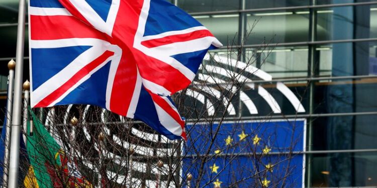 FILE PHOTO: A British Union Jack flag flutters outside the European Parliament in Brussels, Belgium January 30, 2020. REUTERS/Francois Lenoir/File Photo