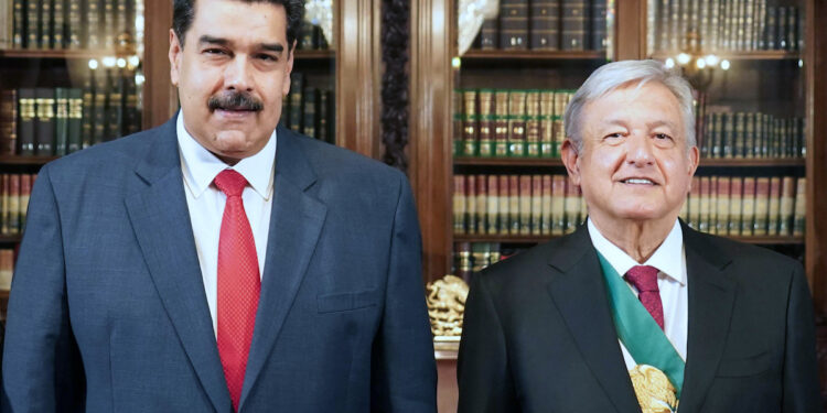 Handout photo released by Lopez Obrador's press office of Mexican President Andres Manuel Lopez Obrador (AMLO) (2-R) and his wife Beatriz Gutierrez Muller (R) posing with Venezuelan President Nicolas Maduro (2-L) and his wife Cilia Flores at the Mexican National Palace on December 1, 2018, during AMLO's inauguration. - Lopez Obrador was sworn in as Mexicoís next president, after the anti-establishment leftist won a landslide election victory promising to "transform" a country fed up with crime, poverty and corruption. (Photo by daniel aguilar / Lopez Obrador's Press office / AFP) / RESTRICTED TO EDITORIAL USE - MANDATORY CREDIT "AFP PHOTO / LOPEZ OBRADOR'S PRESS OFFICE / DANIEL AGUILAR" - NO MARKETING NO ADVERTISING CAMPAIGNS - DISTRIBUTED AS A SERVICE TO CLIENTS