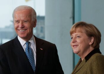FILE - In this Friday, Feb. 1, 2013 file photo German Chancellor Angela Merkel, right, shakes hands with then United States' Vice President Joe Biden after a media briefing prior to a meeting at the chancellery in Berlin, Germany. President-elect Joe Biden brings decades of experience in domestic and foreign policy to the job, and ?he knows Germany and Europe well," Merkel said in her first comments in person on the US election outcome. The chancellor had congratulated Biden and Vice President-elect Kamala Harris in writing on Saturday. (AP Photo/Markus Schreiber)