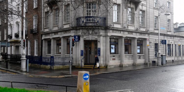 Dublin (Ireland), 19/02/2021.- A pedestrian passes by a branch of Ulster Bank in Dublin, Ireland, 19 February 2021. Irish lender NatWest on 19 February 2021 confirmed it was withdrawing its brand Ulster Bank from the Republic of Ireland market. (Irlanda) EFE/EPA/AIDAN CRAWLEY