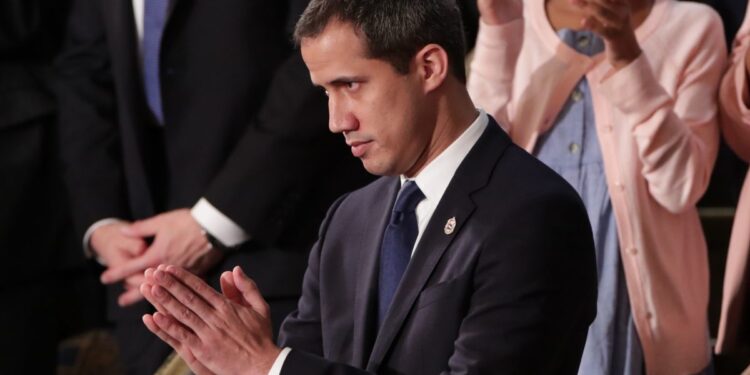 Venezuela's opposition leader Juan Guaido gestures during U.S. President Donald Trump's State of the Union address to a joint session of the U.S. Congress in the House Chamber of the U.S. Capitol in Washington, U.S. February 4, 2020. REUTERS/Jonathan Ernst