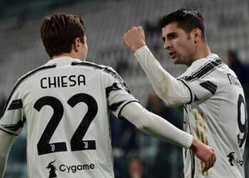 Juventus' Spanish forward Alvaro Morata (R) celebrates with teammate Juventus' Italian forward Federico Chiesa after scoring a goal during the Italian Serie A football match between Juventus and Lazio at The Juventus Stadium in Turin, northern Italy on March 6, 2021. (Photo by MIGUEL MEDINA / AFP)