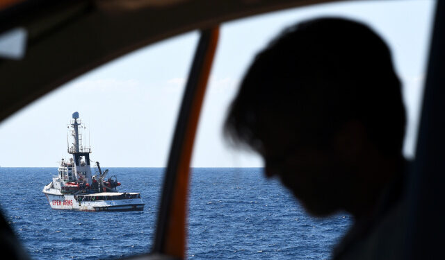 Spanish migrant rescue ship Open Arms is seen close to the Italian shore in Lampedusa, Italy August 20, 2019. REUTERS/Guglielmo Mangiapane