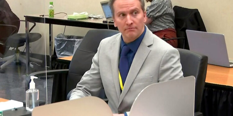 Former Minneapolis police officer Derek Chauvin attends closing arguments during his trial for second-degree murder, third-degree murder and second-degree manslaughter in the death of George Floyd with his defense attorney Eric Nelson in Minneapolis, Minnesota, U.S. April 19, 2021 in a still image from video.  Pool via REUTERS