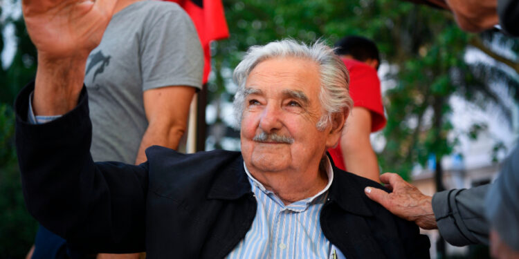 Uruguay's former President (2010-2015) and candidate for senator for the Frente Amplio ruling party, Jose Mujica, is greeted by supporters in Montevideo, on October 25, 2019, ahead of Sunday's general election.  / AFP / Eitan ABRAMOVICH