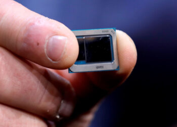 FILE PHOTO: An Intel Tiger Lake chip is displayed at an Intel news conference during the 2020 CES in Las Vegas, Nevada, U.S. January 6, 2020. REUTERS/Steve Marcus/File Photo