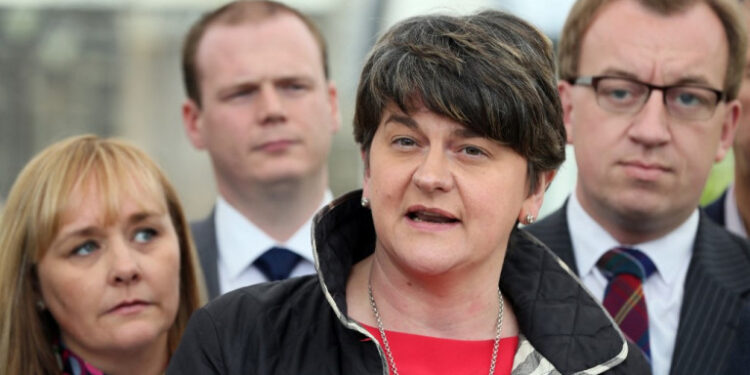 (FILES) In this file photo taken on July 3, 2017 Democratic Unionist Party (DUP) leader Arlene Foster gives a statement to the press at Stormont Castle in Belfast, as talks continue to form a power-sharing government in Northern Ireland. - Arlene Foster on Wednesday April 28, announced her resignation as Northern Ireland's first minister and leader of the Democratic Unionist Party (DUP), at a tense time in the British province. The 50-year-old politician said she would step down as DUP leader on May 28 and as first minister at the end of June, calling it "the privilege of my life" to lead the country. (Photo by Paul FAITH / AFP)