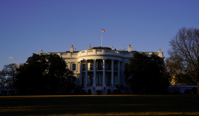 The White House is seen at sunset in Washington, U.S. March 6, 2021. REUTERS/Erin Scott