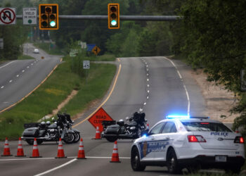 Dolley Madison Boulevard is blocked off by law enforcement in response to a security-related situation outside of the secure perimeter near the main gate of CIA headquarters in McLean, Virginia, U.S. May 3, 2021. REUTERS/Leah Millis